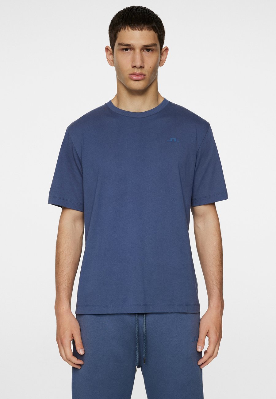 

Футболка J.LINDEBERG Sports Sports T-shirt, Vintage Indigo/Blue, Синий, Футболка J.LINDEBERG Sports Sports T-shirt, Vintage Indigo/Blue