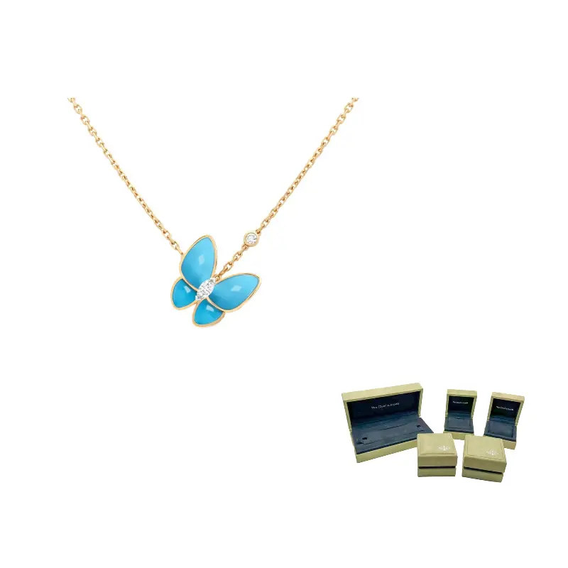 

Van Cleef & Arpels Подвеска-бабочка из желтого золота 18 карат с бриллиантами и бирюзой