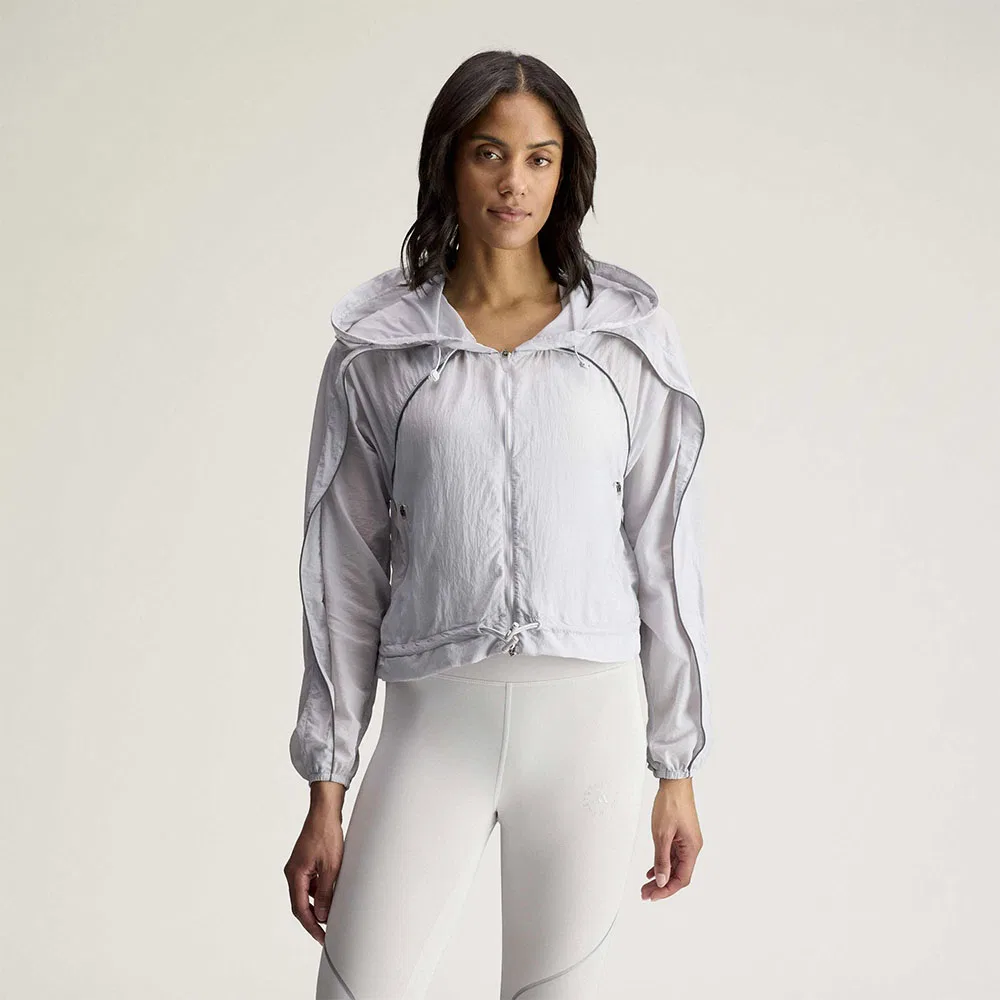 Женская беговая куртка Adidas by Stella McCartney светло-серого цвета от Adidas