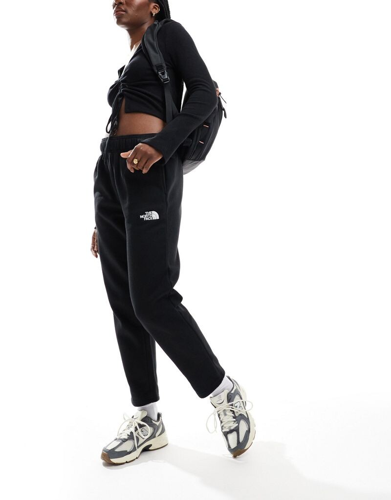 

Черные спортивные брюки The North Face Evolution Cocoon