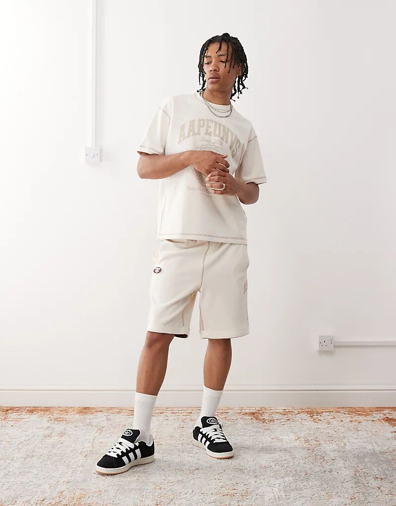 

Двусторонние шорты из толстовки с логотипом Aape by A Bathing Ape цвета «бежевый». Aape By A Bathing Ape