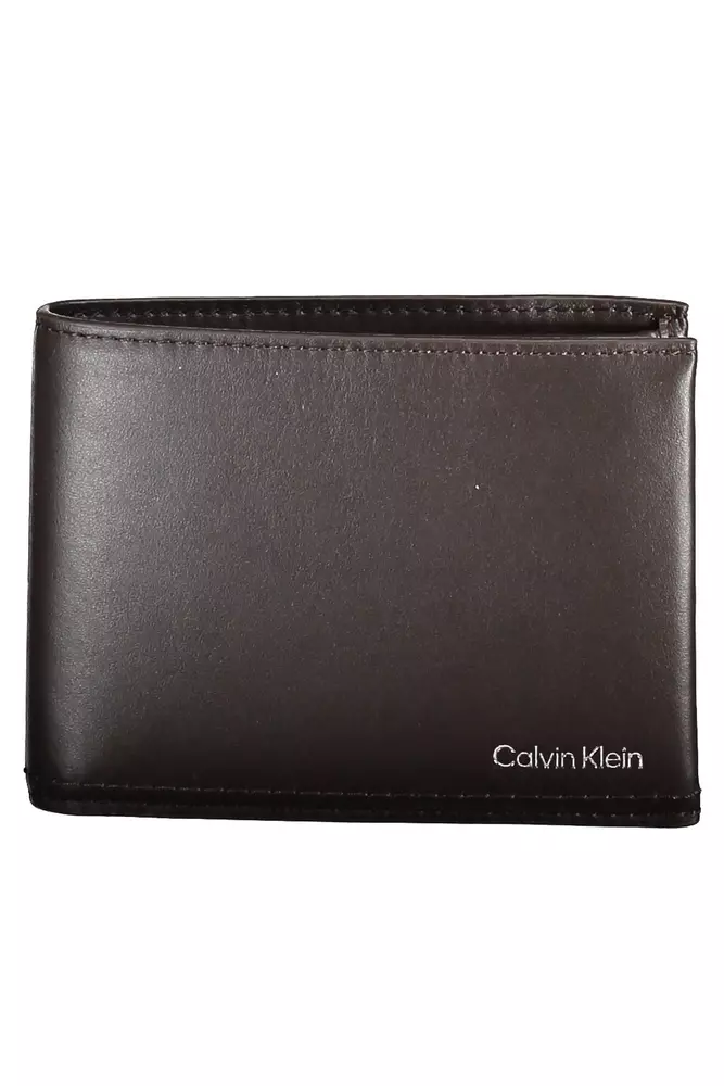 

Коричневый кожаный мужской кошелек Calvin Klein