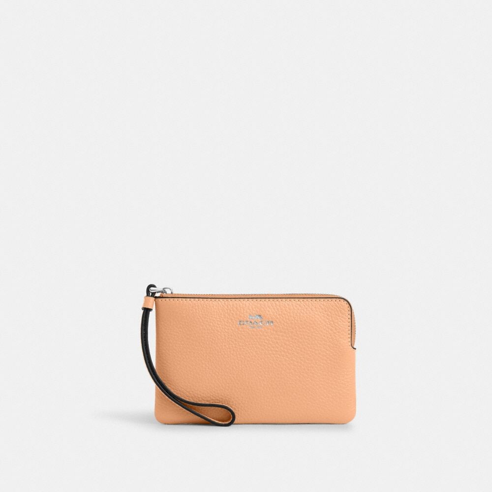 

Сумка-ристлет COACH Corner Zip Wristlet, цвет Sv/Faded Blush