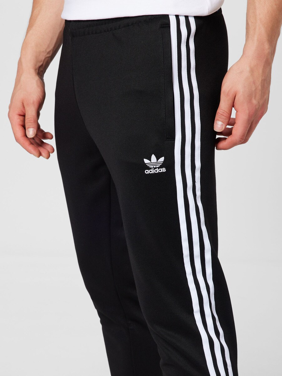 Зауженные тренировочные брюки ADIDAS ORIGINALS Adicolor Classics SST, черный — фото 3