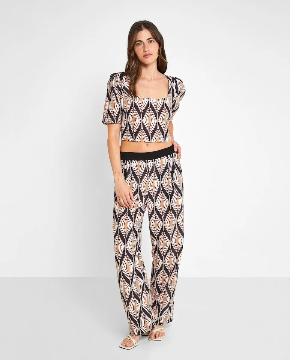 

Женские широкие брюки с принтом и контрастной талией Trucco, черный/оранжевый