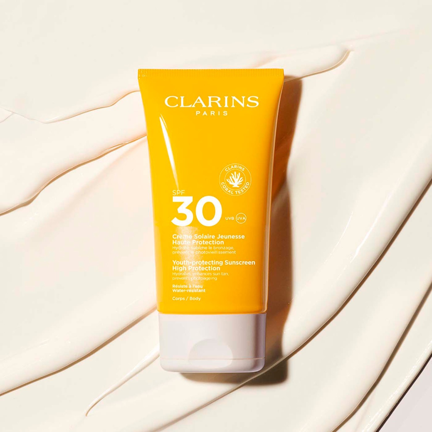 Солнцезащитный крем sun care youth-protecting sunscreen spf30 Clarins, объем 150 мл. — фото 2