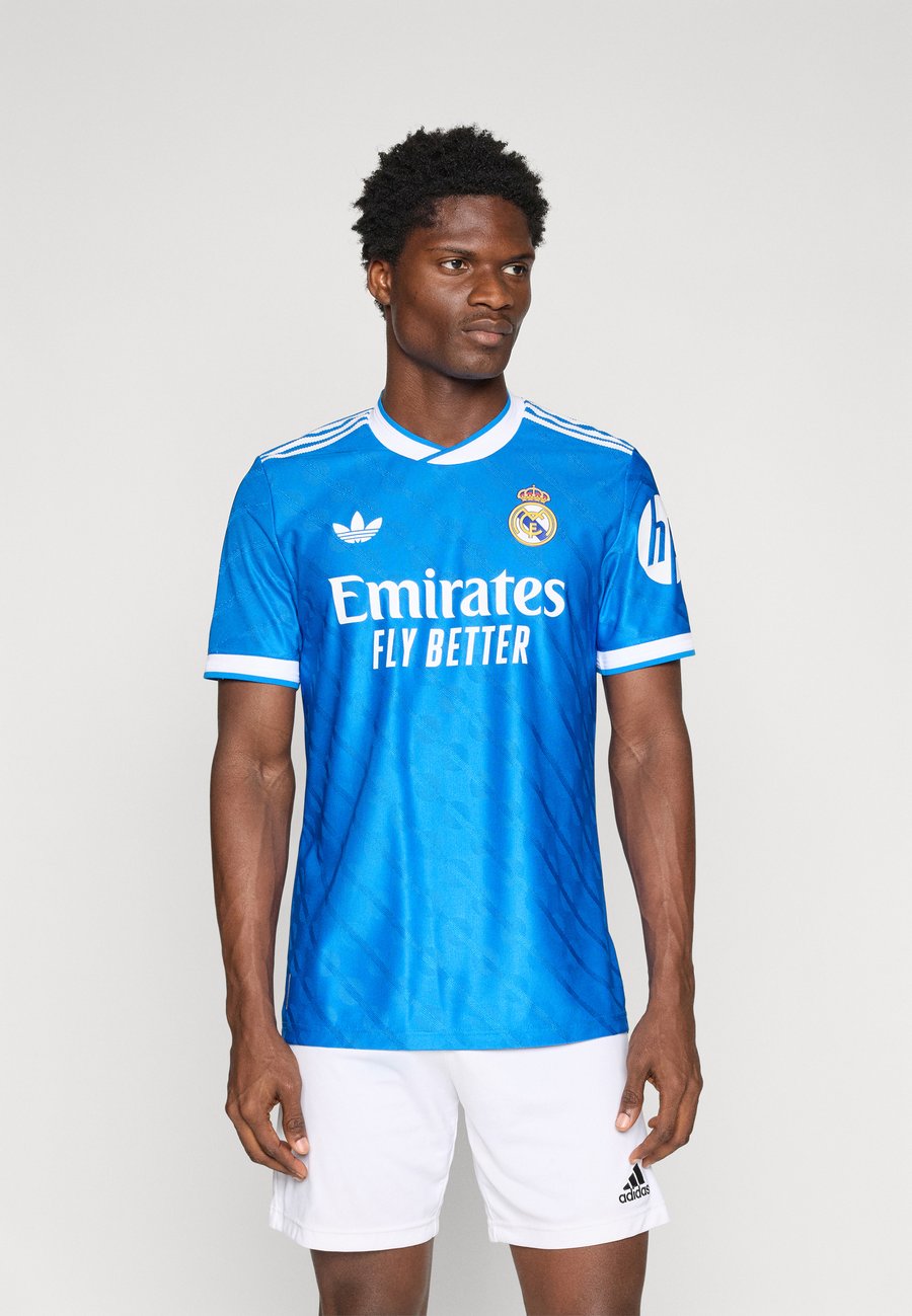 

Футболка Adidas Originals REAL MADRID 25/26 THIRD AUTHENTIC JERSEY, Bluebird/Blue, Синий, Футболка Adidas Originals REAL MADRID 25/26 THIRD AUTHENTIC JERSEY, Bluebird/Blue