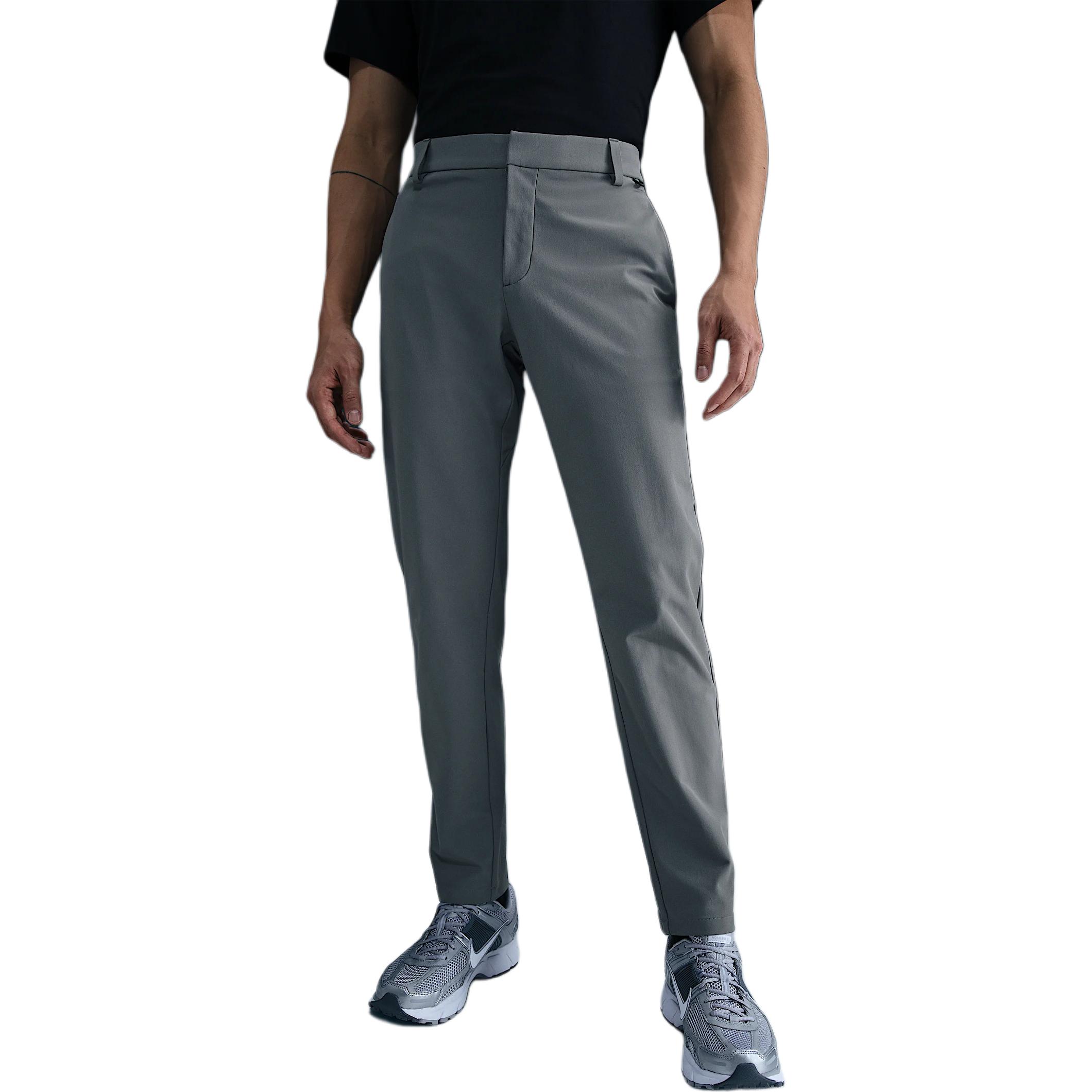 

247 PerfectStretch Мужские брюки Dri-FIT с 5 карманами, зауженного кроя Nike, smoke серый