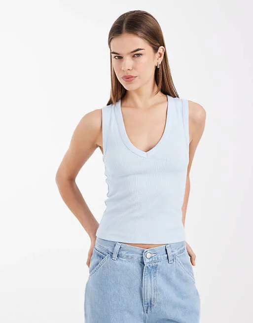 

Голубой жилет в рубчик с v-образным вырезом ASOS DESIGN