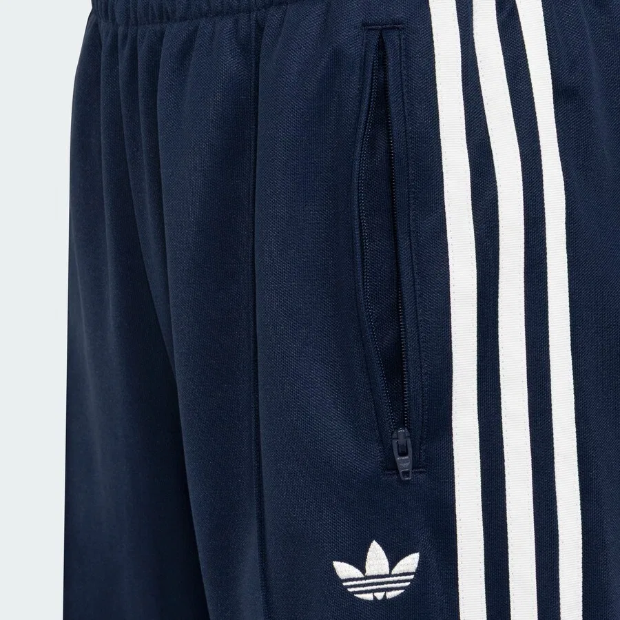 Брюки ADIDAS ORIGINALS свободного кроя '2IN1 FIREBIRD LOOSE LACE SKIRT' цвета индиго — фото 3