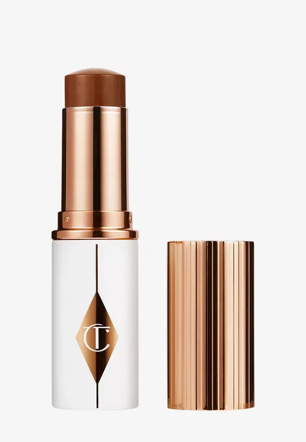 Невероятно сияющая тональная основа для лица Unreal Skin Sheer Glow Tint 9 г Charlotte Tilbury, цвет 14_deep