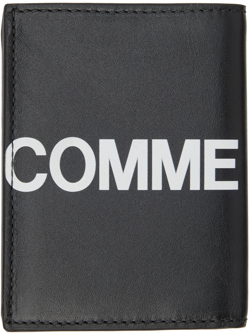 

Черная визитница с огромным логотипом Comme des Garçons Wallets