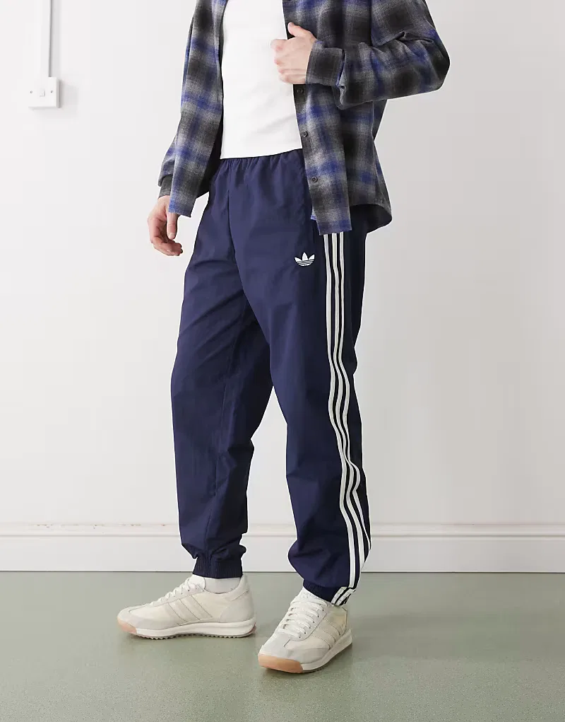 Тканые спортивные брюки Adidas Originals Firebird, синий
