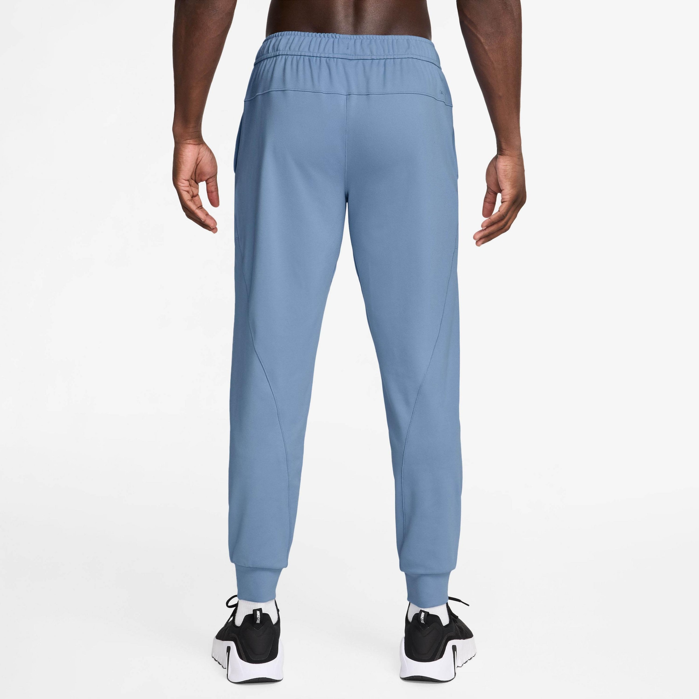 Nike Sportswear Брюки с зауженным низом в синем цвете — фото 4