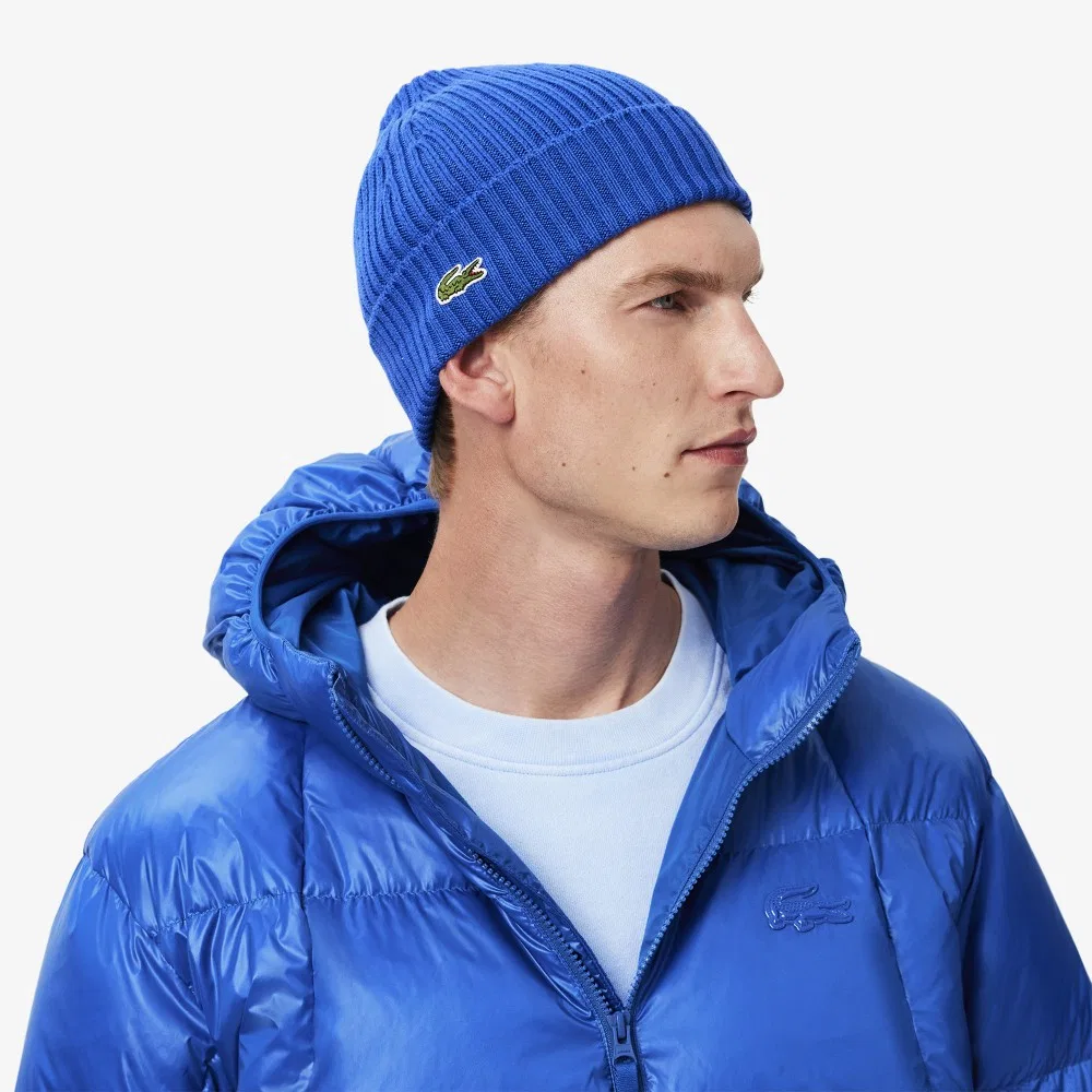 Мужской блестящий пуховик синего цвета от Lacoste — фото 2