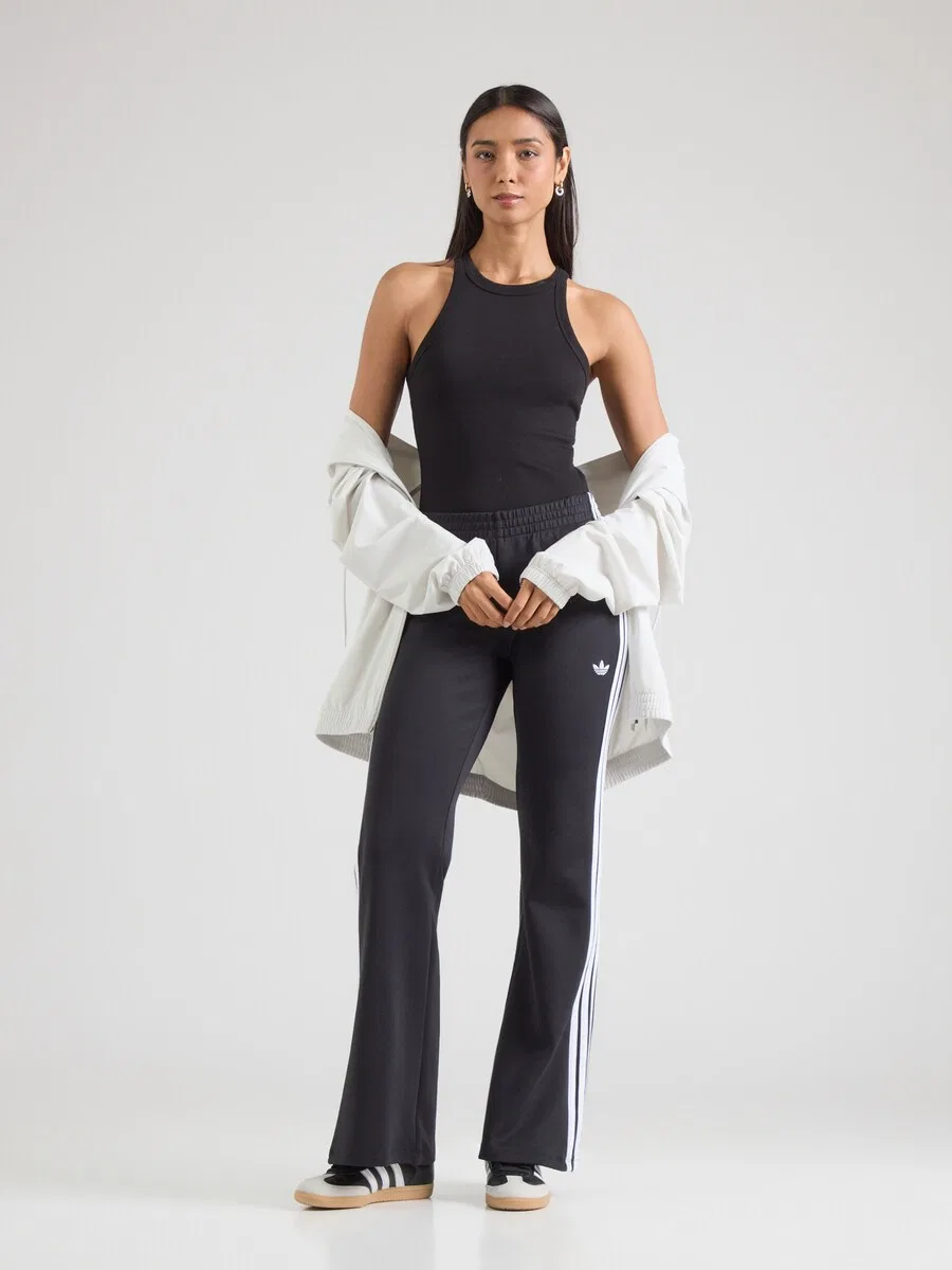 Расклешенные брюки ADIDAS ORIGINALS черного цвета — фото 4