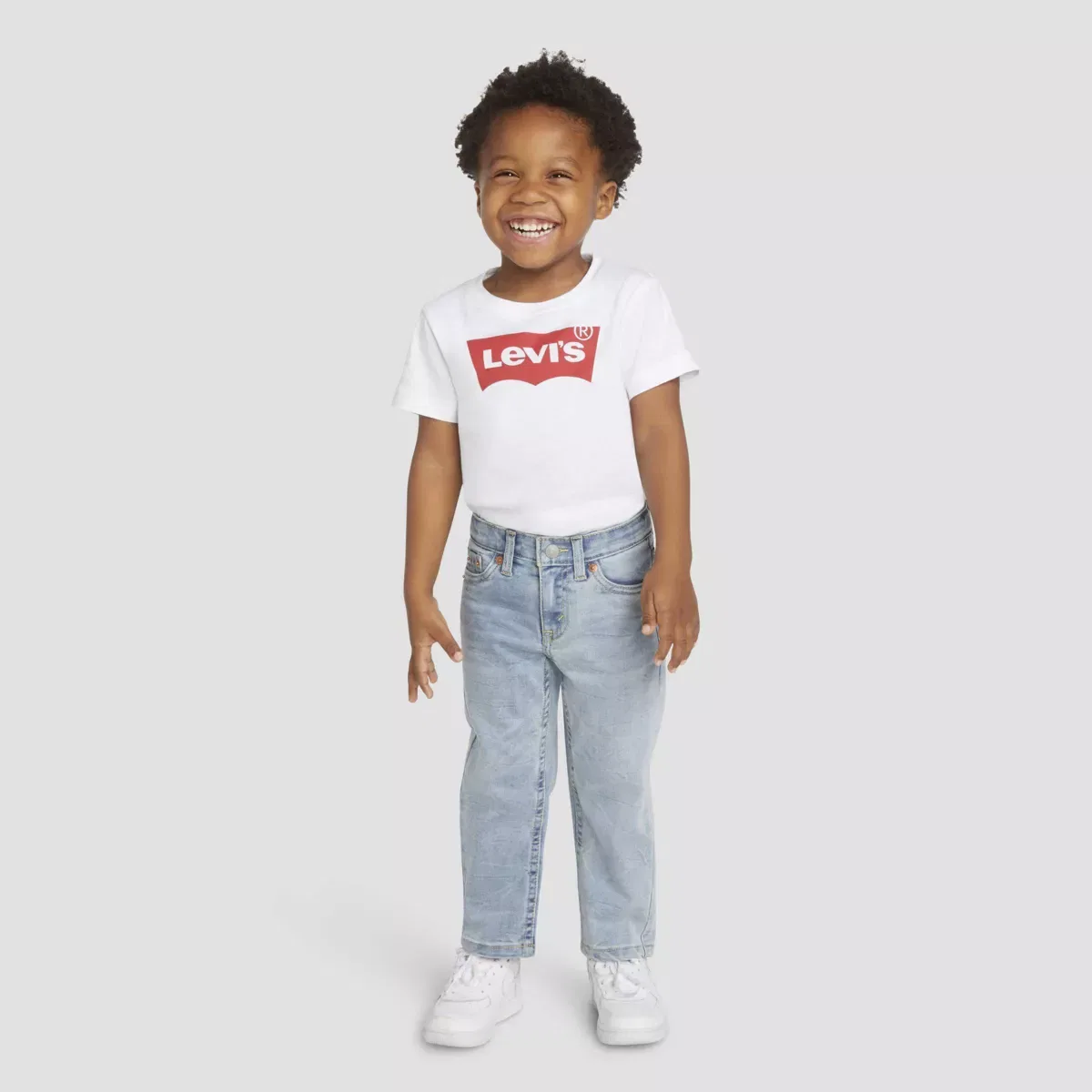 Детские джинсы для мальчиков с зауженным кроем 502 Regular Taper Strong Performance Levi's, Medium Wash — фото 2