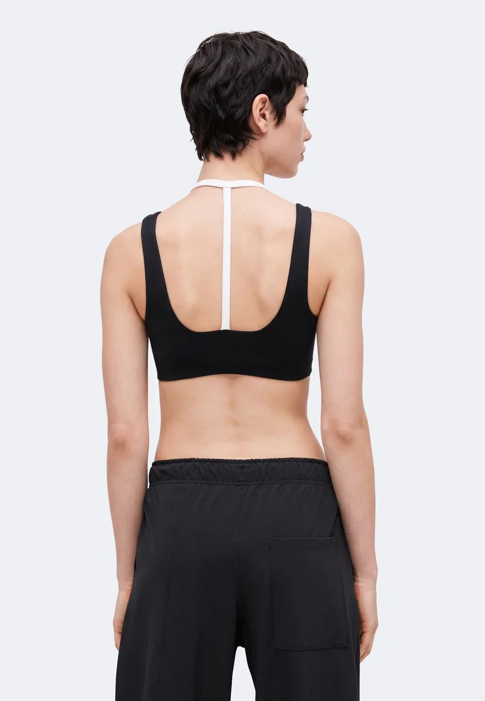 W nk1 df strappy pad bra e+ - спортивный бюстгальтер с легкой поддержкой Nike Performance, Black/White — фото 3