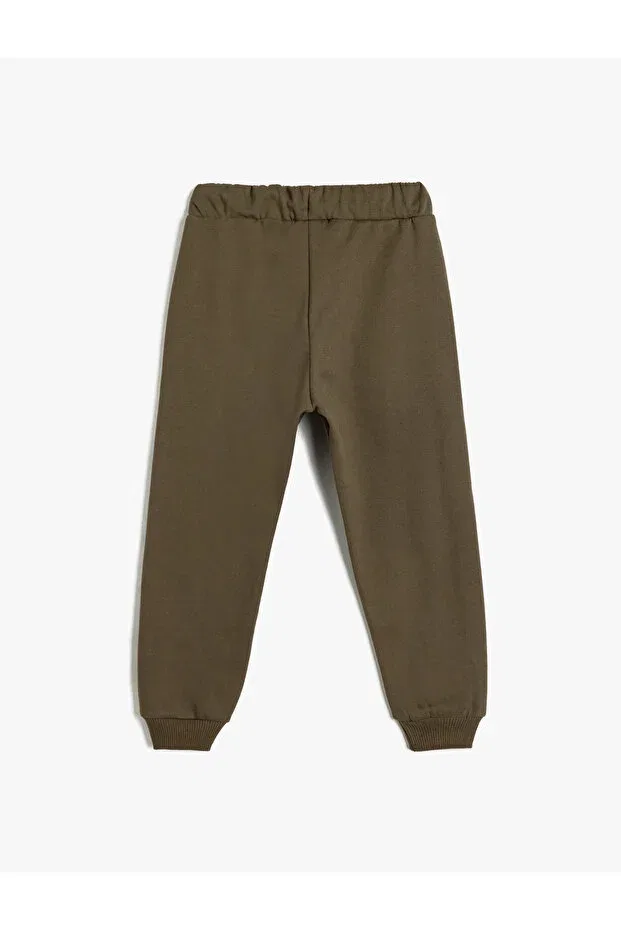 Детские спортивные штаны для мальчиков с принтом College printed pocket tie waist raster jogger Koton, Khaki — фото 2