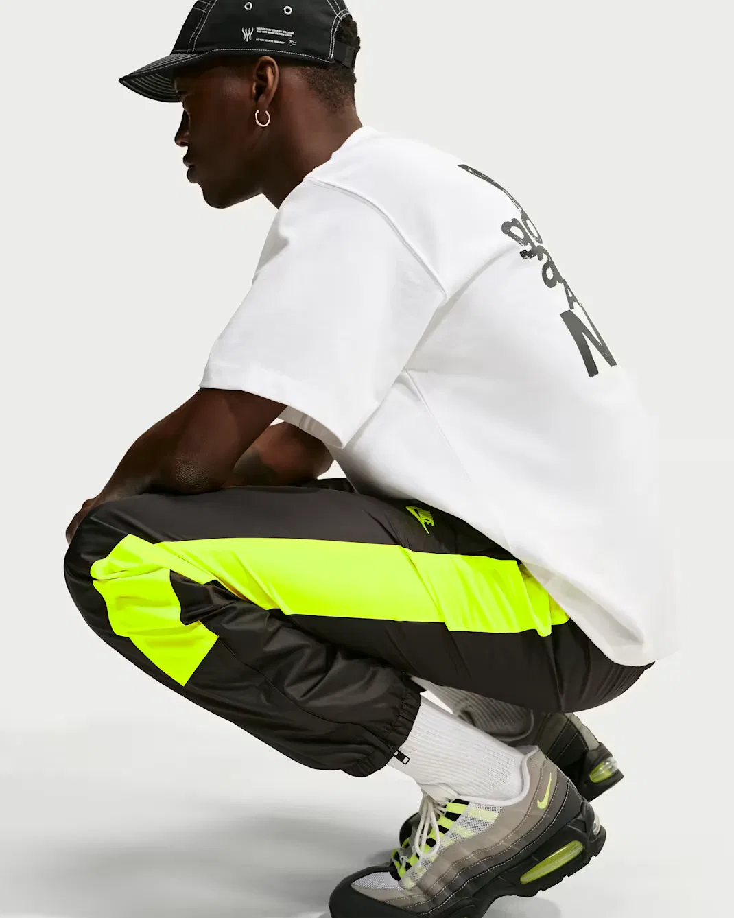 Мужские брюки на подкладке Nike Windrunner, Black/Volt/Volt — фото 4