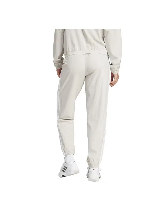 Брюки спортивные с зауженным кроем Workout Essentials 3-Stripes Adidas, бежевый — фото 3