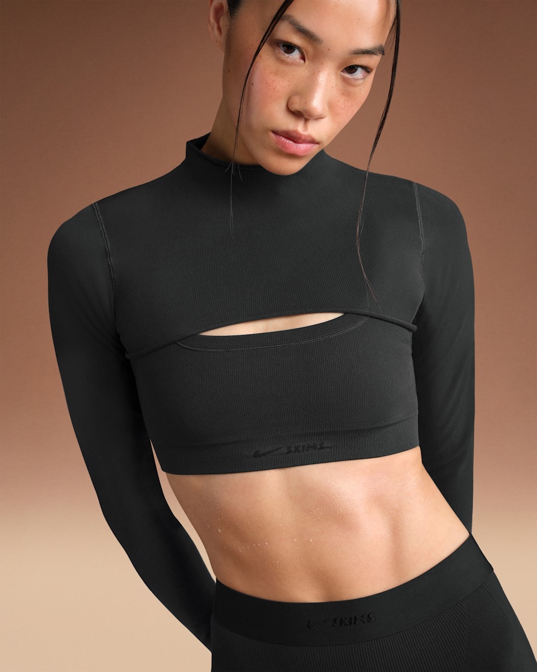 

Спортивный топ NikeSKIMS Vintage Seamless Women's Long-Sleeve, черный