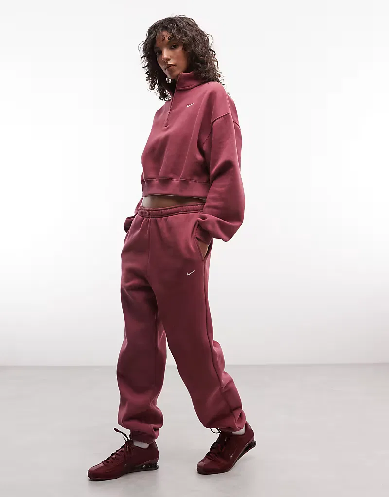 Спортивные брюки Nike Studio Fleece средней плотности, свободного кроя, с отворотами, розовый