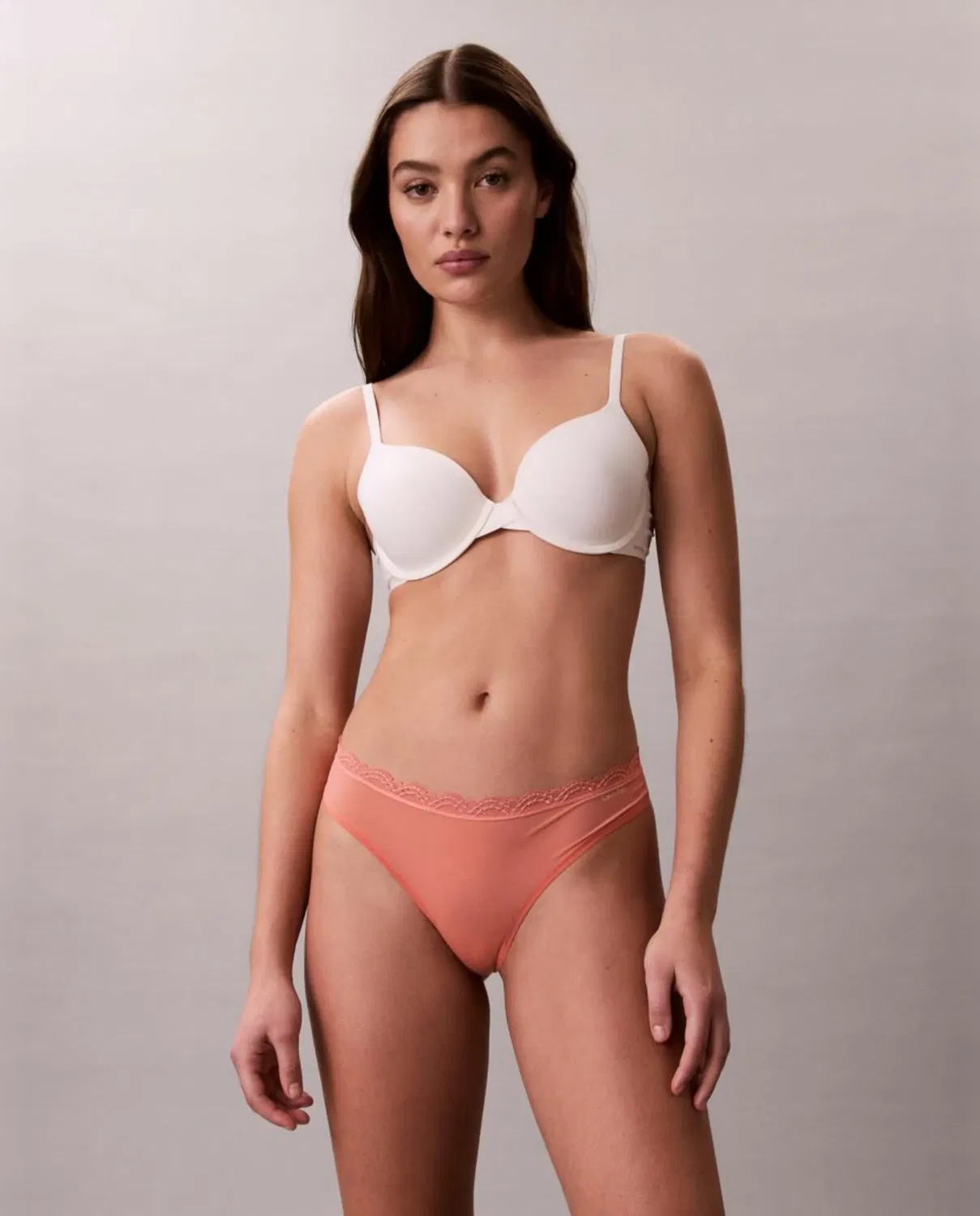 Женские трусы-танга с кружевом Calvin Klein, Naranja — фото 2