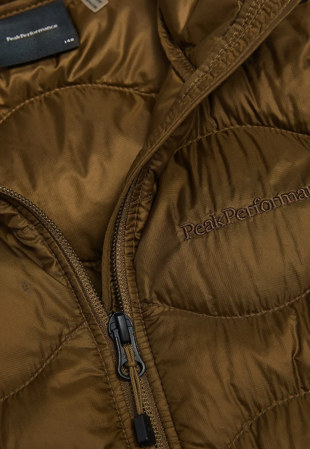 Жилет унисекс с гелиевым наполнителем (Jr helium down vest unisex) Peak Performance, Khaki — фото 4