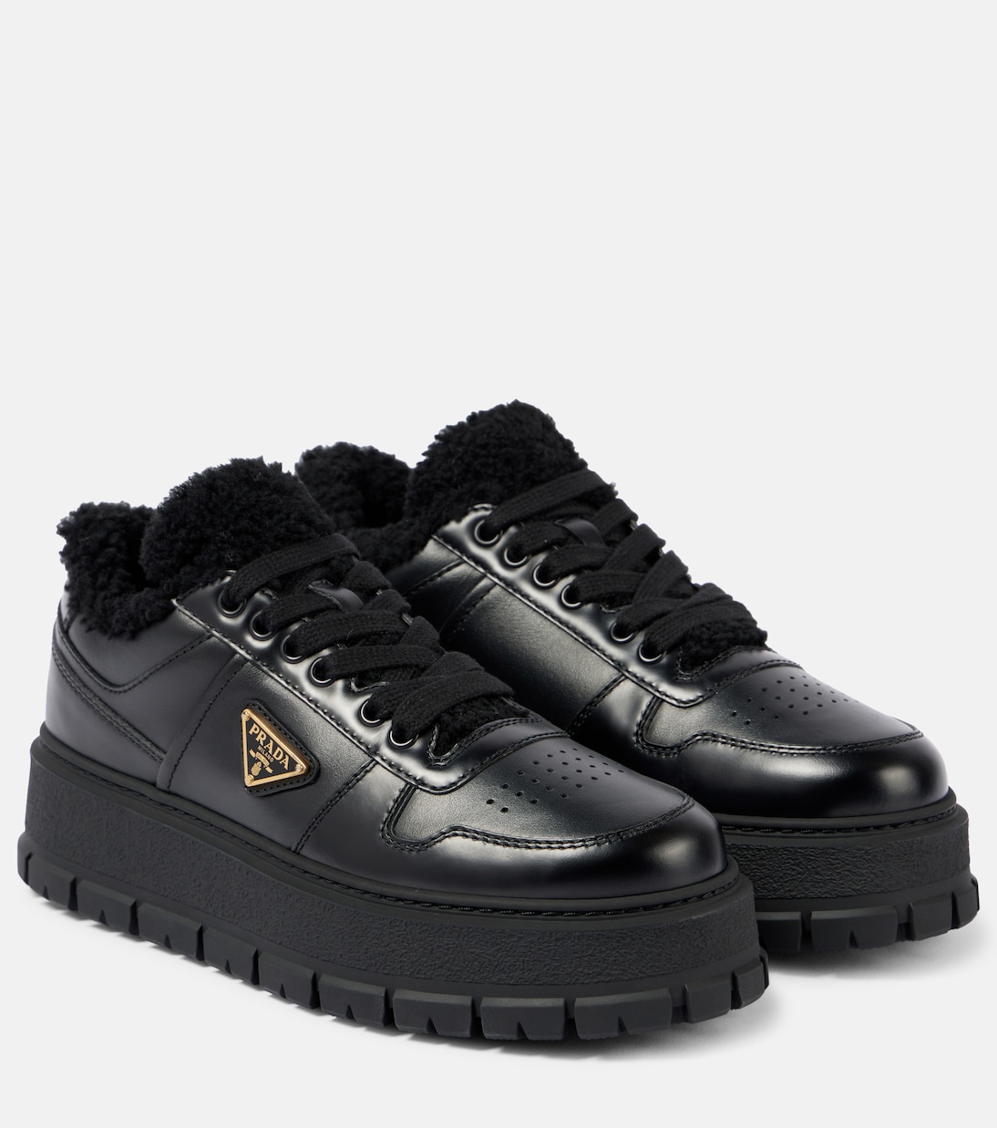 Кожаные платформенные кроссовки с меховой подкладкой Prada, черный