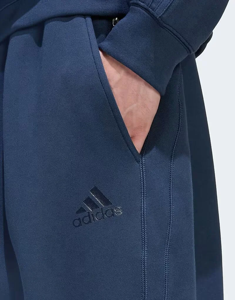 Брюки Adidas Originals Spacer с открытым низом и разрезом по низу, цвет Aurora Ink — фото 3
