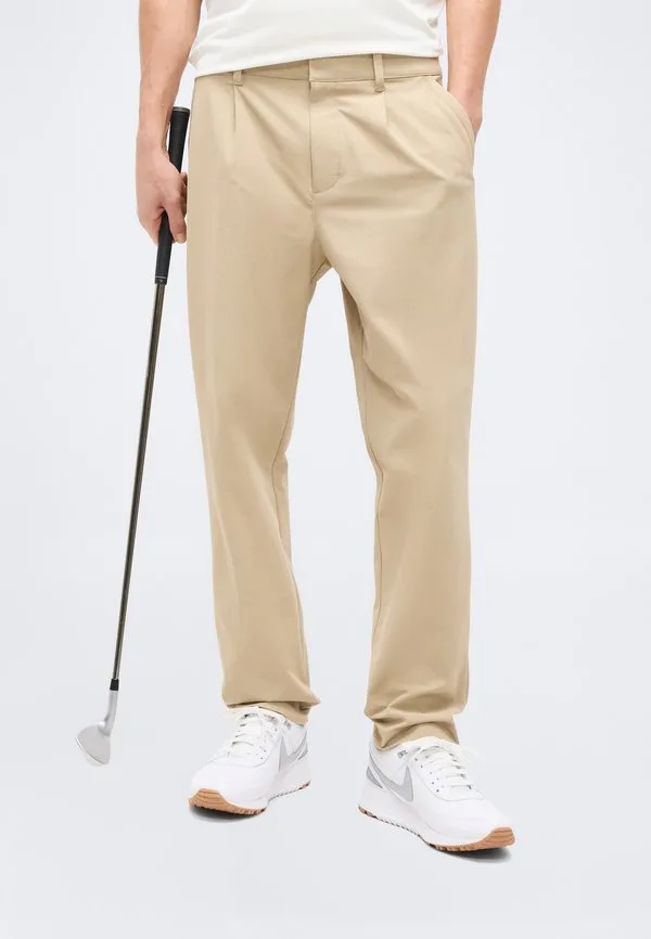 Узкие брюки par Nike Golf, Limestone/Black