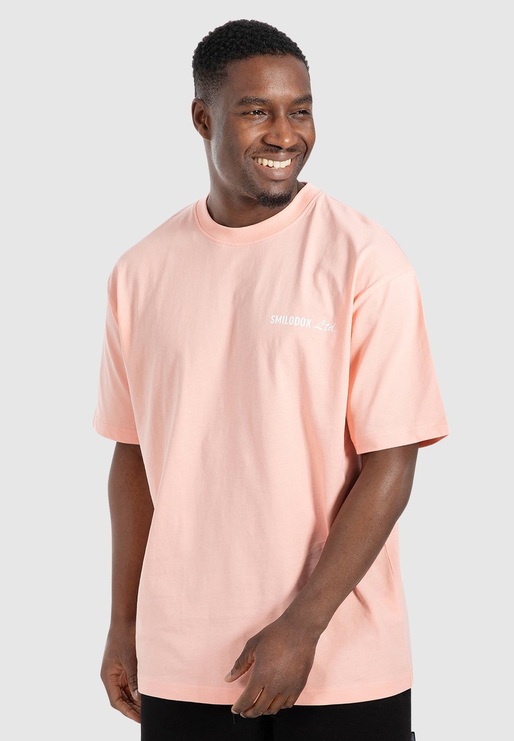 

Футболка с принтом UNISEX Smilodox, розовый