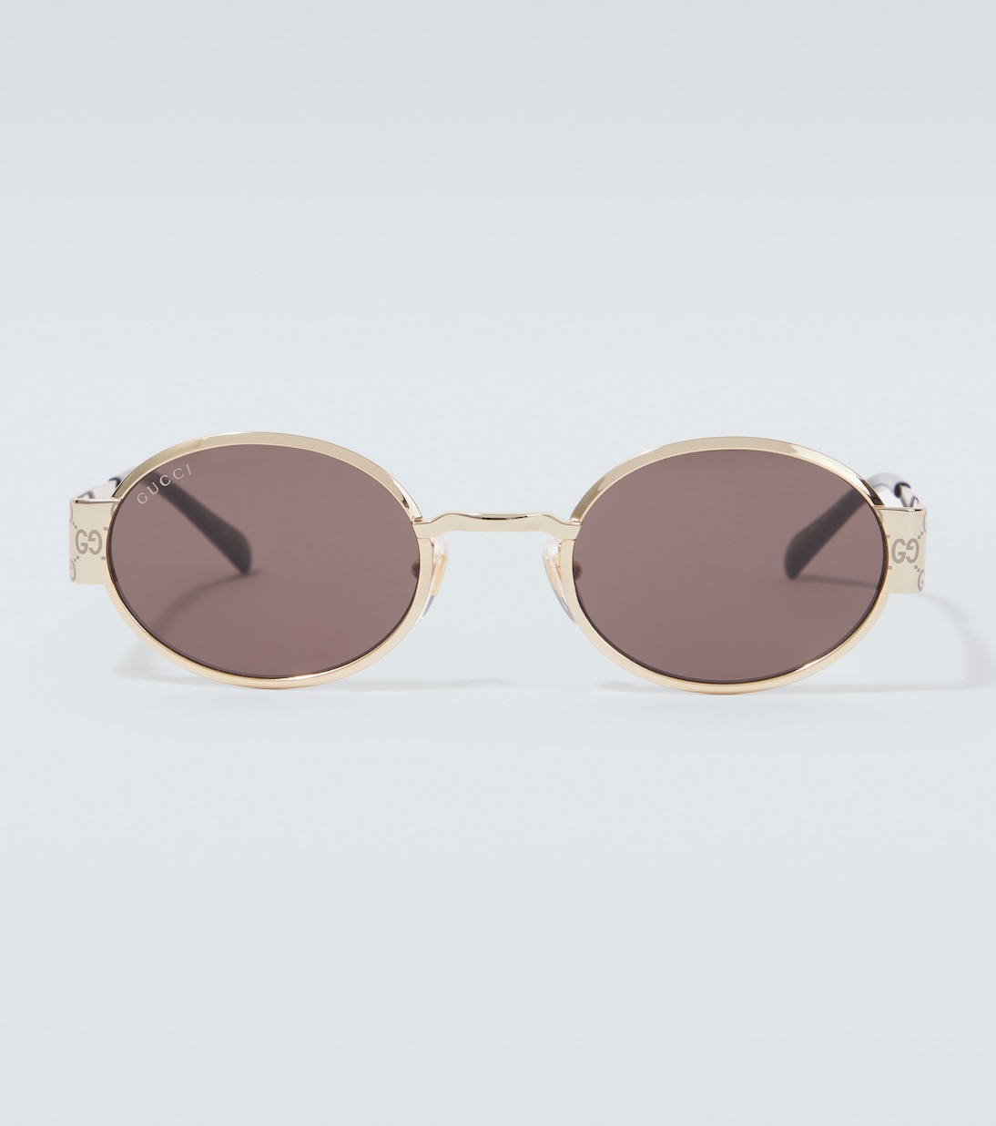 

GG овальные солнцезащитные очки Gucci