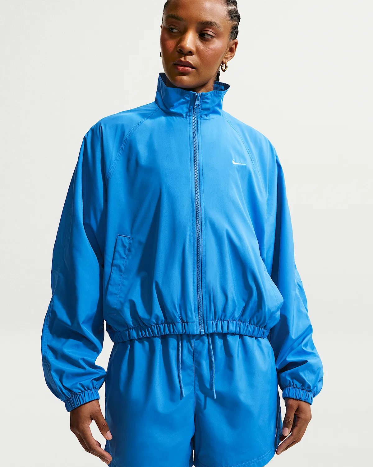 Женская оверсайз трековая куртка Nike Sportswear с защитой от УФ, Light Photo Blue/Sail