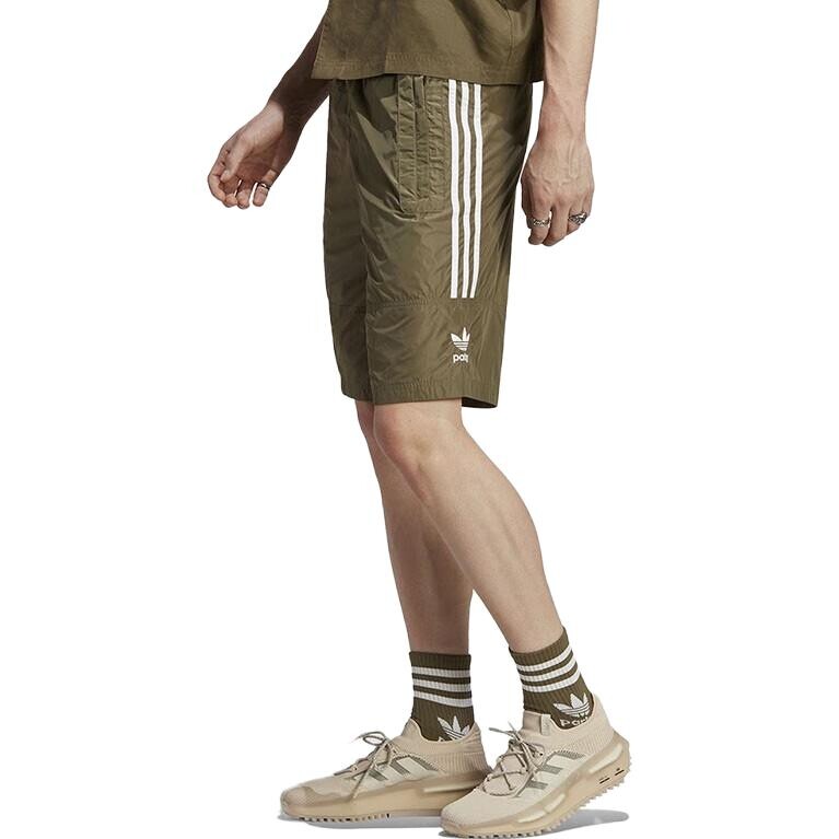 ADICOLOR Повседневные шорты мужские Оливково-зеленые Adidas Originals, оливково-зеленый — фото 4