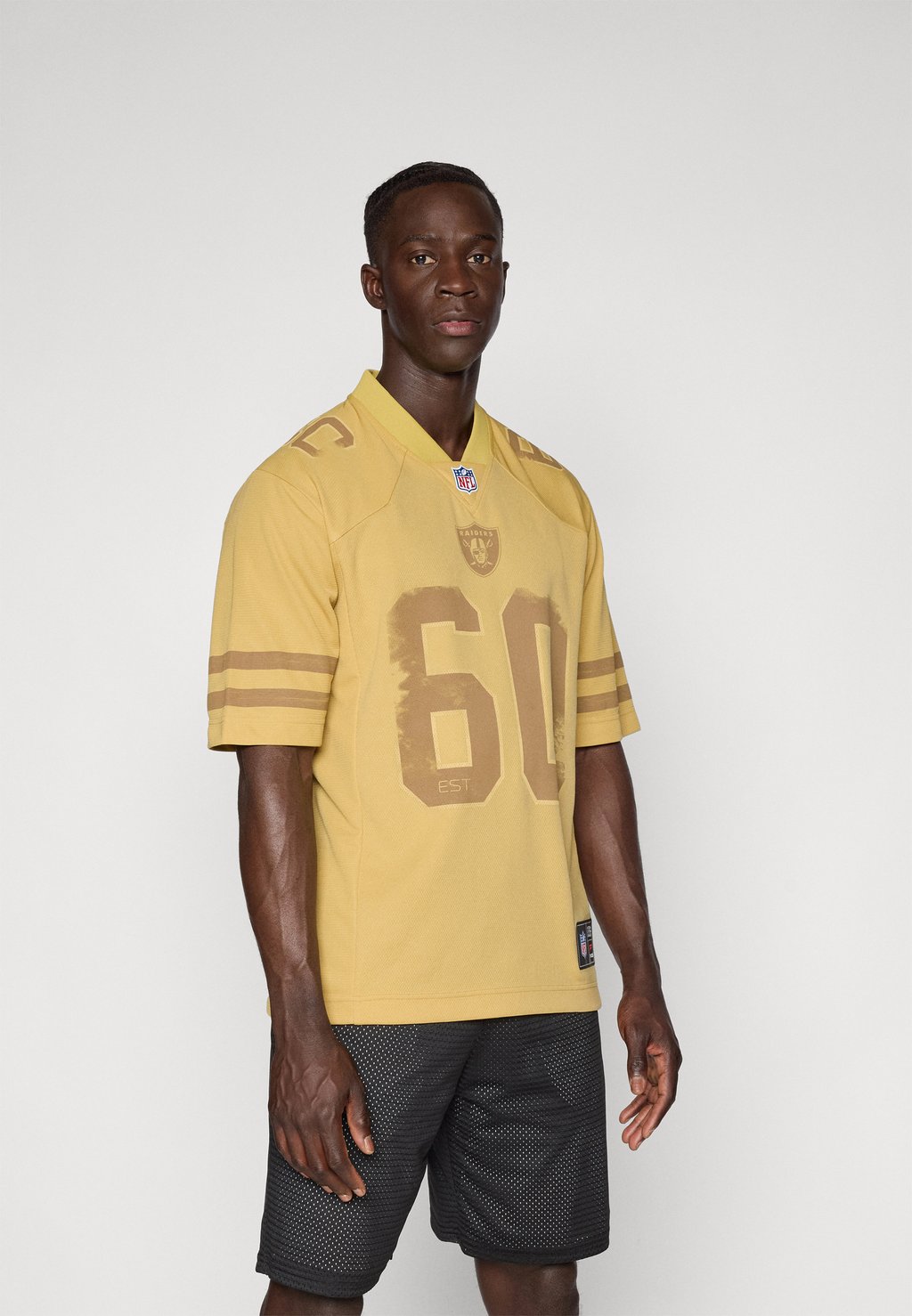 

Футболка с принтом NFL LAS VEGAS RAIDERS DYSTOPIA FOUNDATION - Club wear Fanatics, золотой
