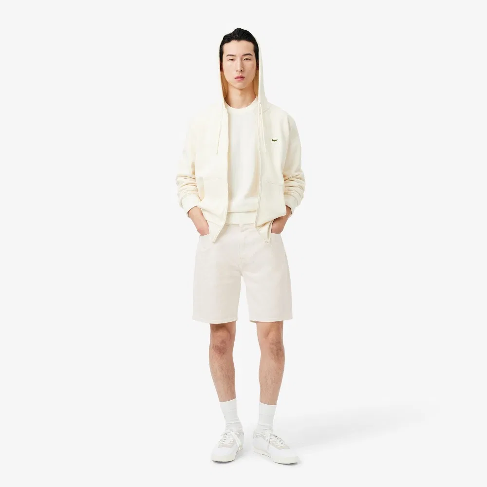 Мужские джинсовые шорты бермуды молочного цвета от Lacoste — фото 4