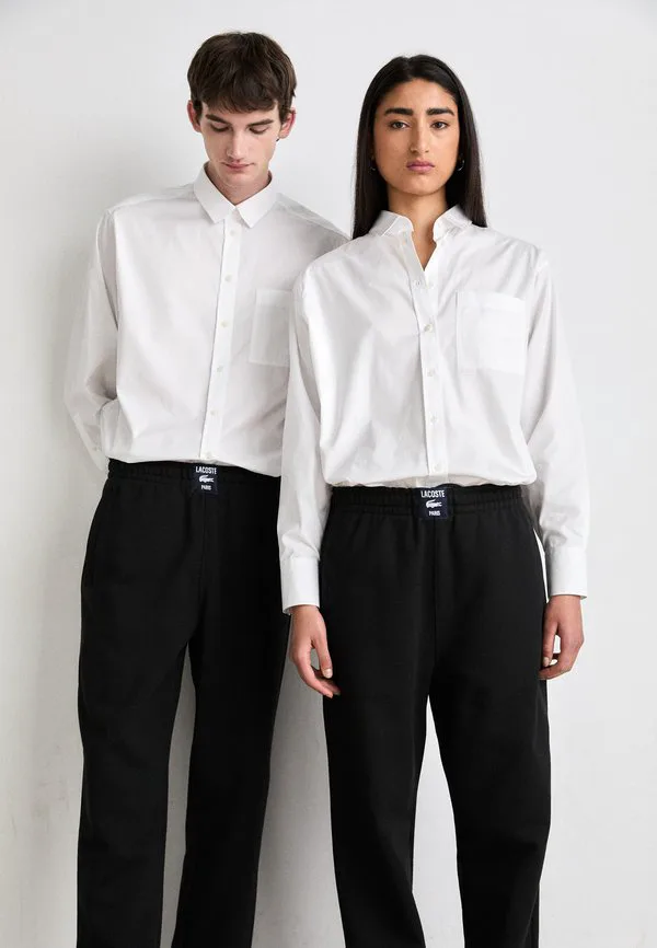 Спортивные штаны унисекс Lacoste, Black — фото 4