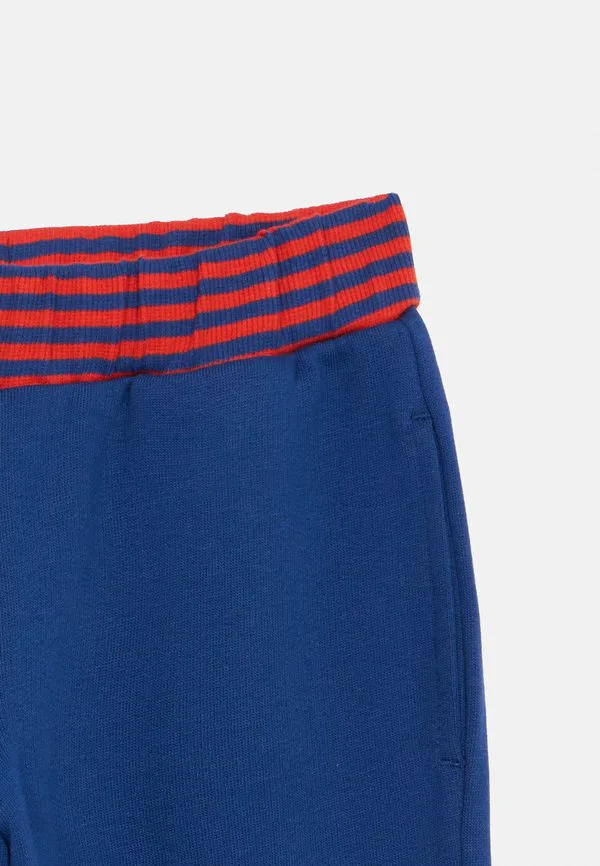 Полосатые спортивные штаны унисекс Mini Rodini, Blue — фото 3