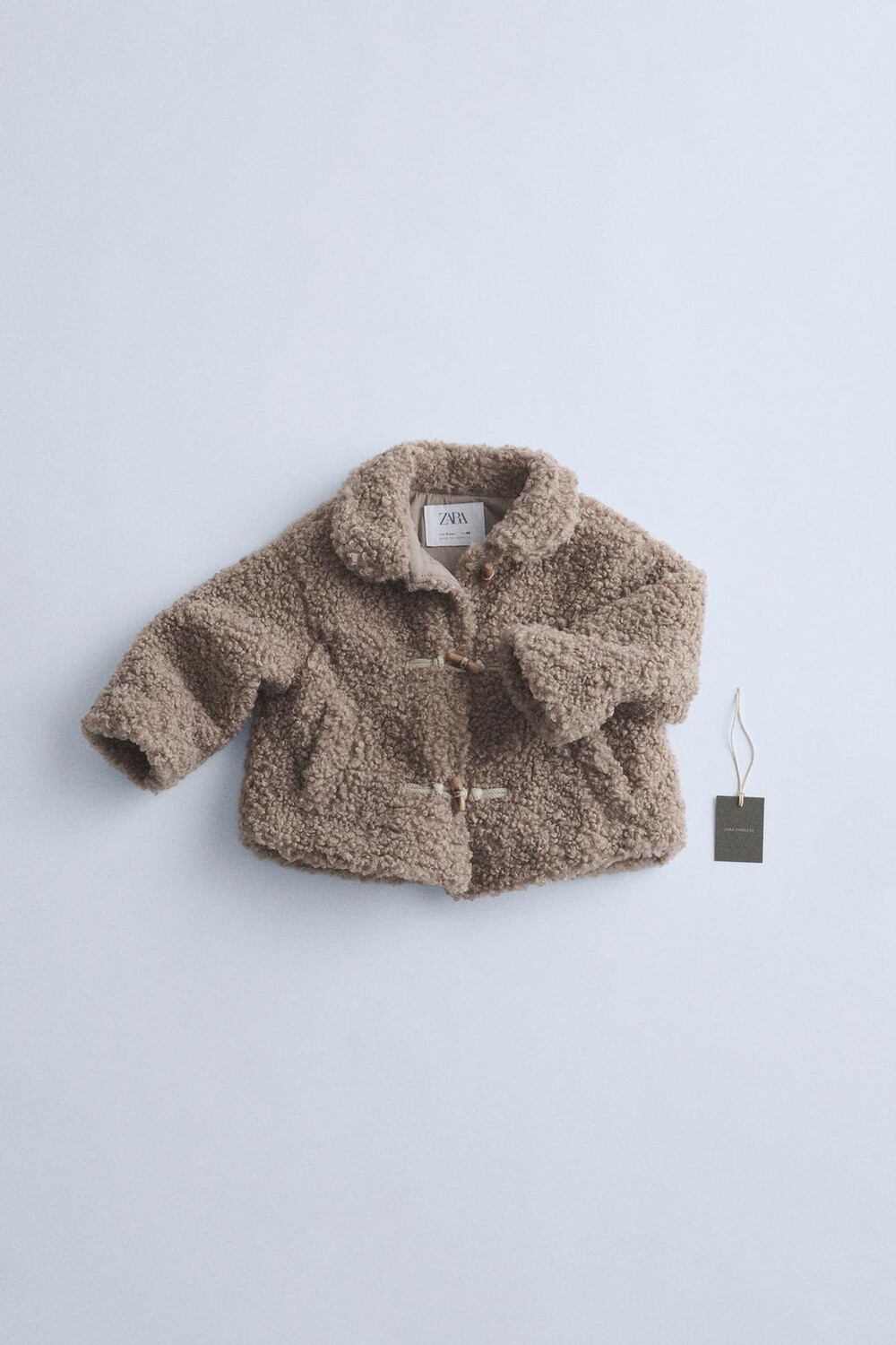 

Куртка из искусственной овчины с застежками ZARA, коричневый/серо-коричневый