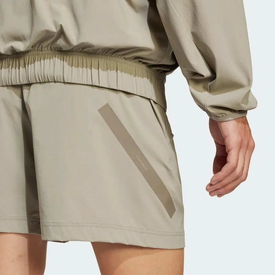 Спортивные шорты с боковыми карманами adidas Z.N.E. Woven Shorts, Бежевый — фото 4