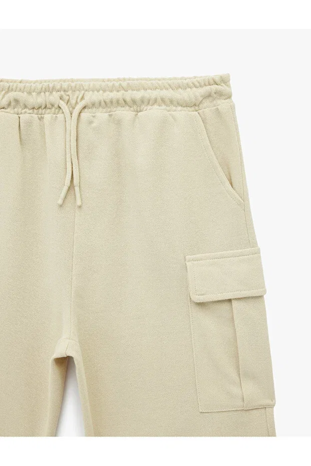 Детские шорты для мальчиков хлопковые Beli lace-up cotton shorts with flap pockets Koton, Beige — фото 3
