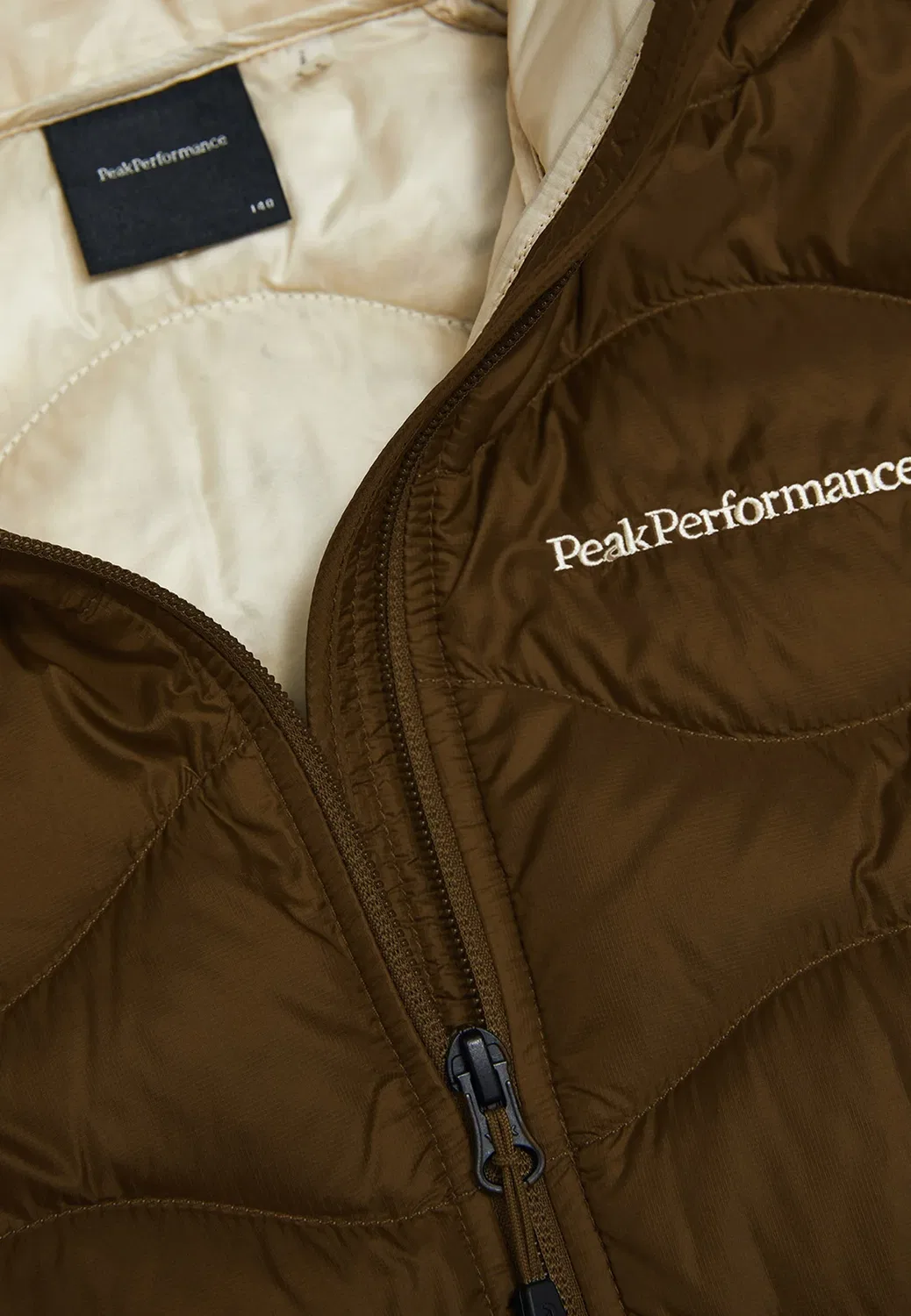 Пуховая куртка унисекс Peak Performance, Khaki — фото 3