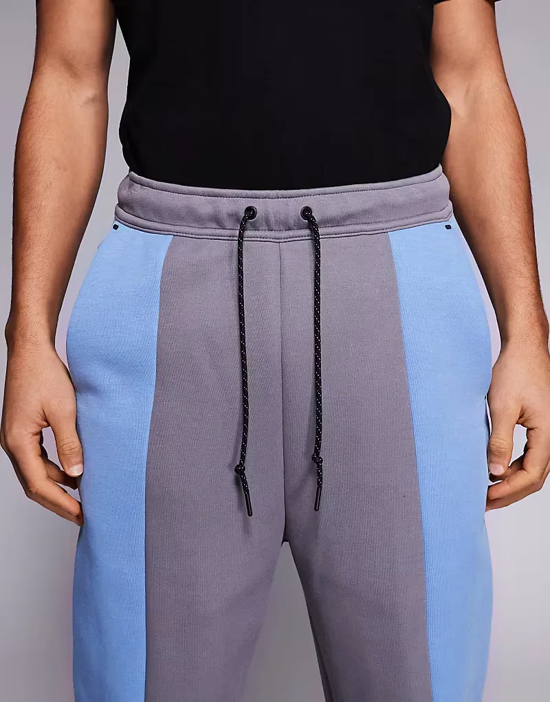 Спортивные брюки Nike Tech Fleece Pro с открытым низом, серые и темно-синие — фото 4