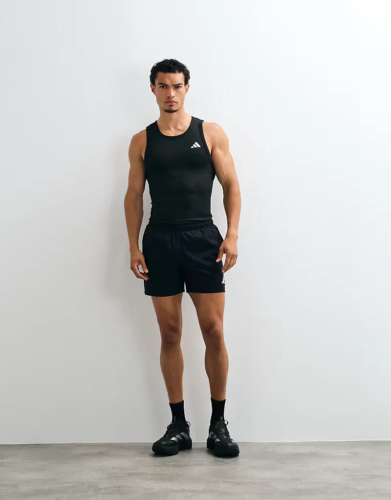 Ребристый жилет Adidas Training Essentials, черный — фото 4