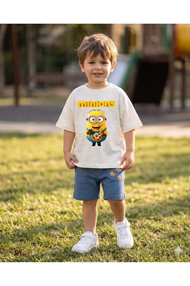Детская футболка оверсайз с принтом Minions themed children's oversize t-shirt - unisex 100% cotton t-shirt with cookie-loving character print Babytex, Ecru