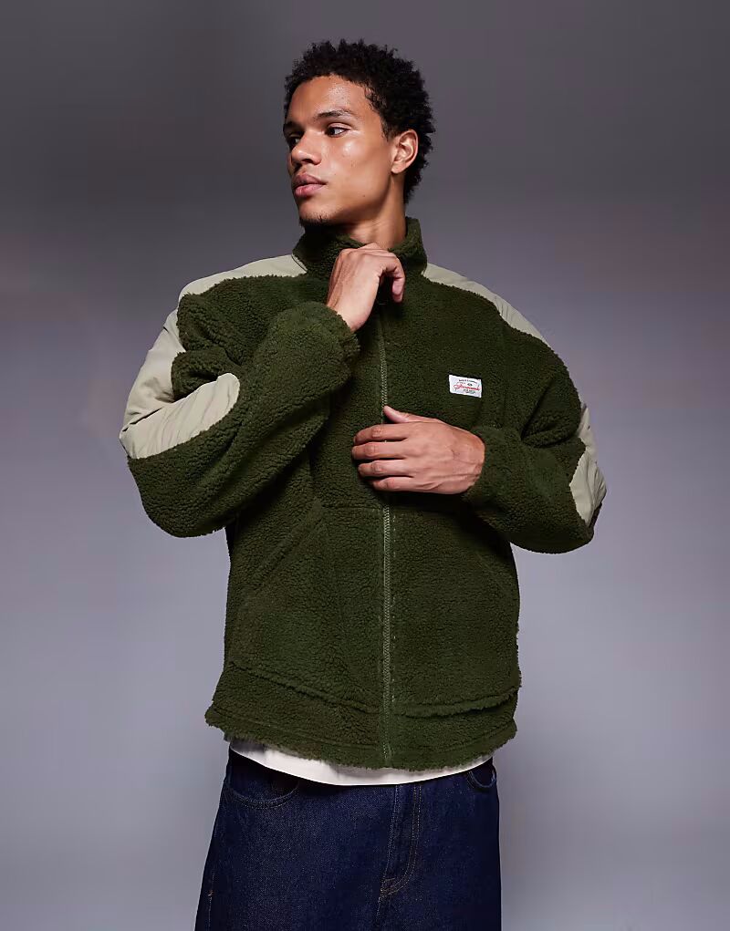 

Свободный свитшот с воротником-стойкой, застежкой-молнией и контрастными вставками зеленого цвета Asos Design