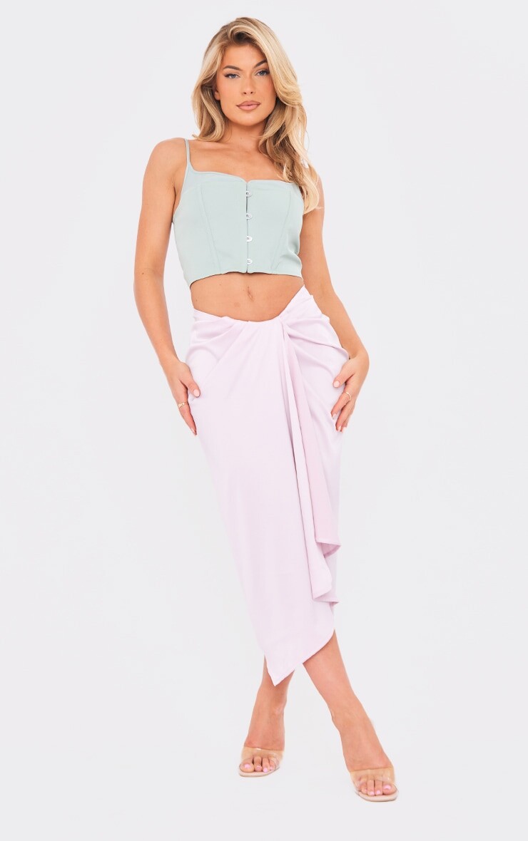 

PrettyLittleThing Сиреневая тканая юбка-миди с открытой драпировкой спереди
