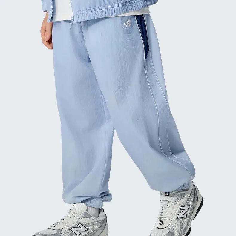 Детские спортивные штаны New Balance Light Blue — фото 4